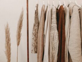 Sustainable clothing rack with neutral outfits for best sustainable fashion brands