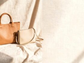 Elegant pre owned designer bags displayed on a neutral background in a soft luxury setting.